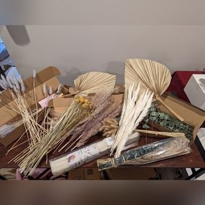 Pampas grass, dried palm leaves, cattails
